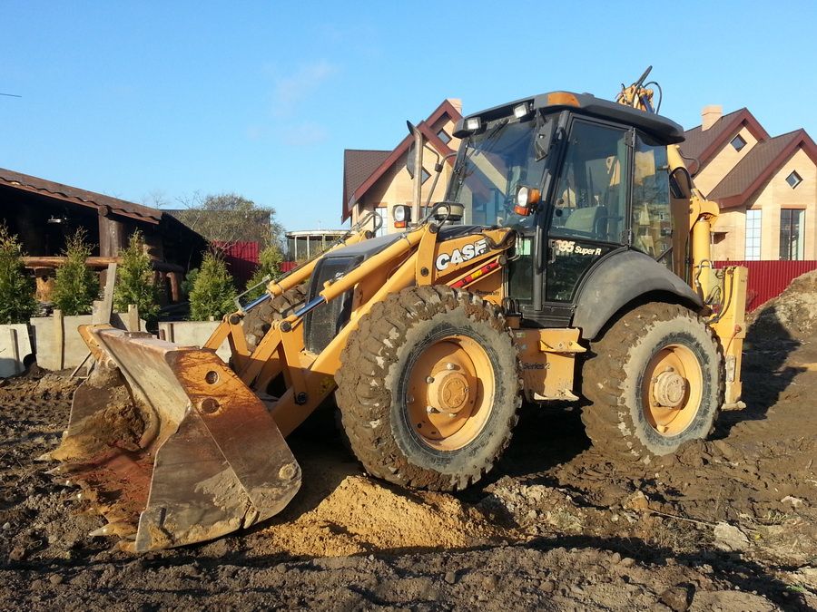 БУ экскаватор-погрузчик